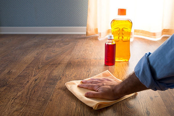 Clean Wood Floor from Dirt and Dust Using Liquids