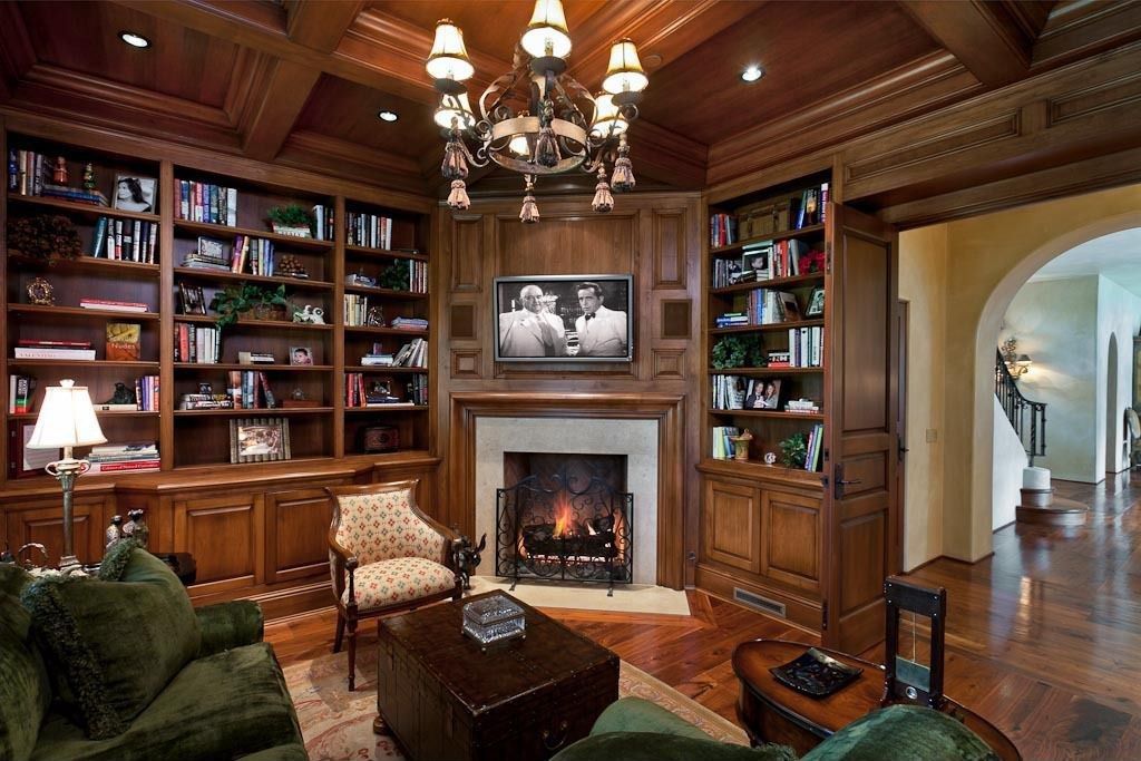 Warm Mini Library Near the Fireplace