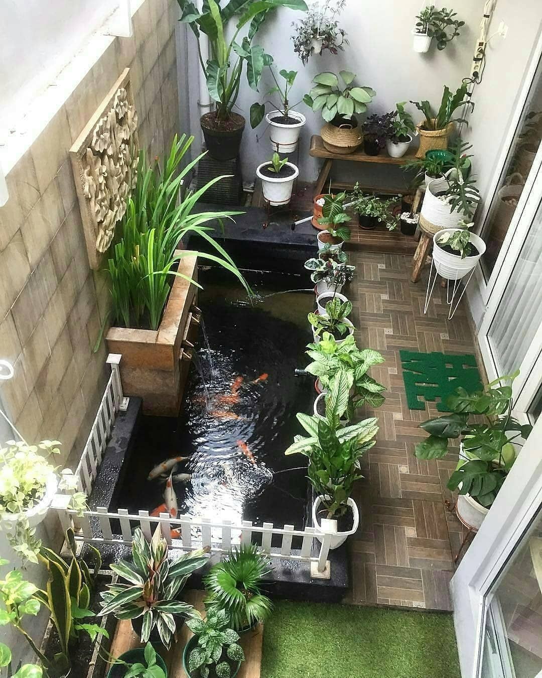 Minimalist Fish Pond Built in with a House