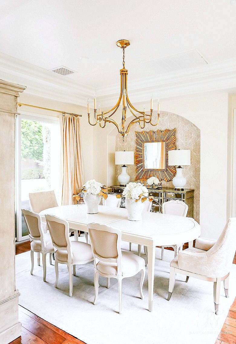 White Dining Room with Elegant Gold Accents