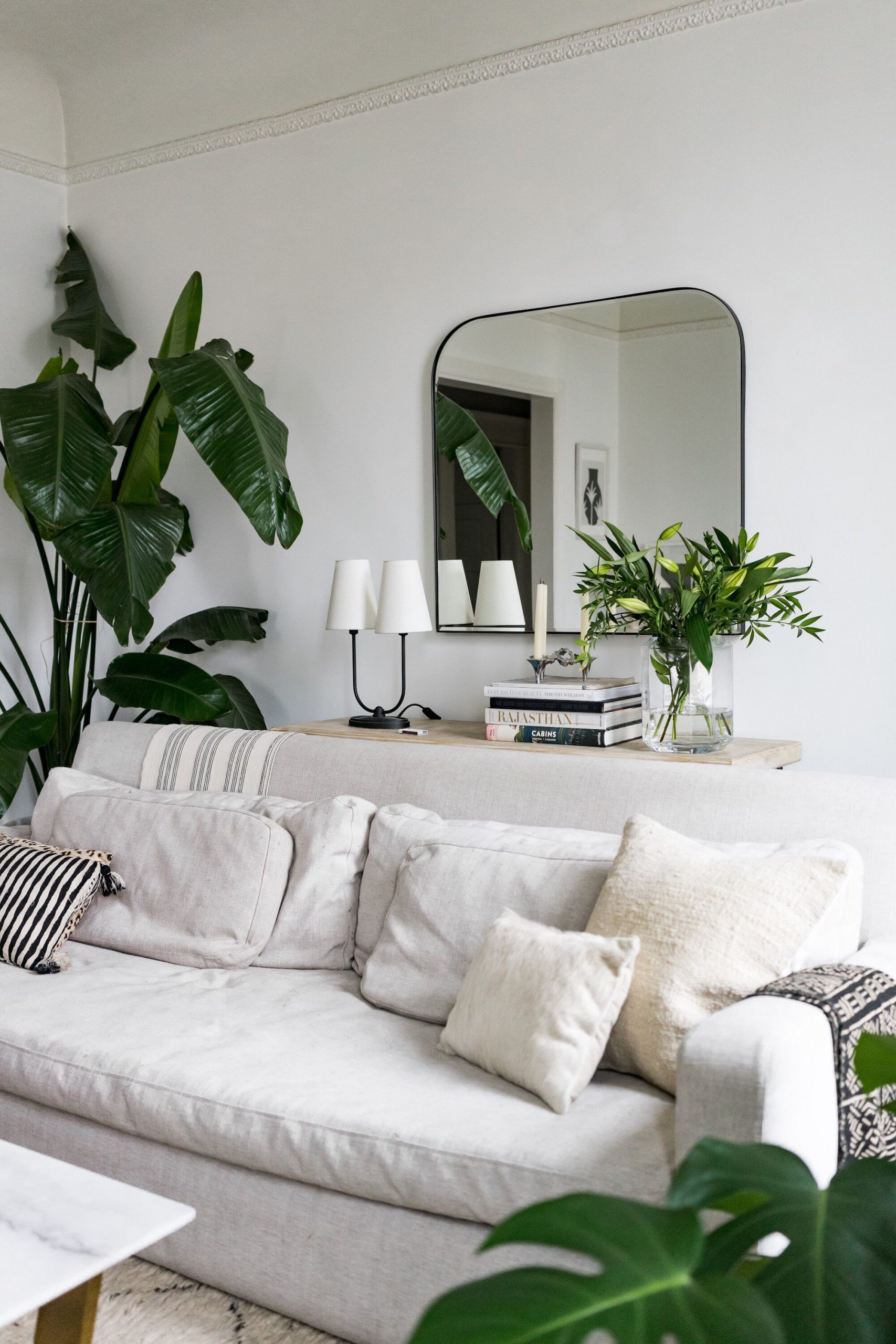 Chic Interior with A Natural Reflection on The Wall Mirror