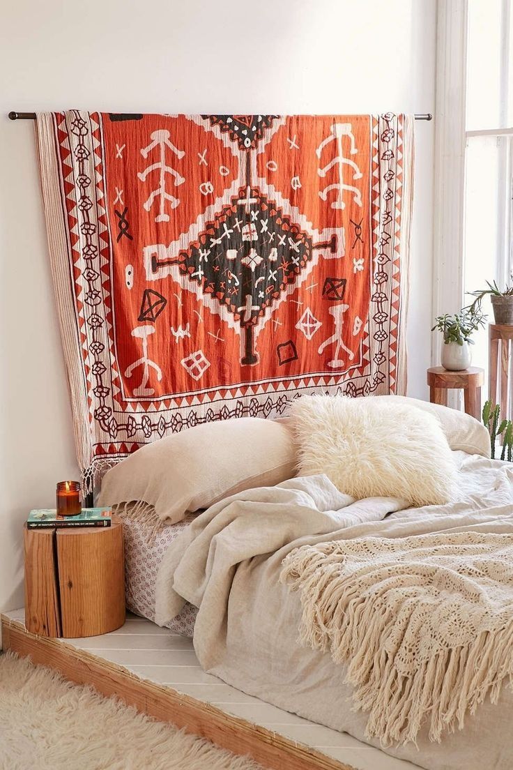 A Dreamy Bedroom with An Eccentric Tapestry