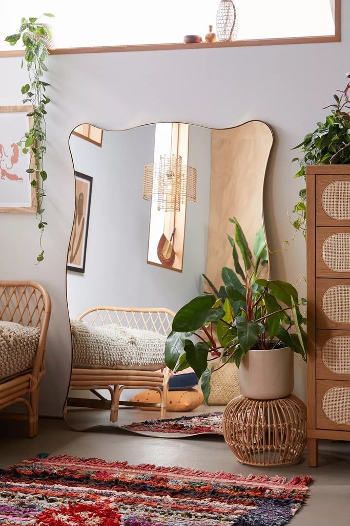 A Wide Mirror with Curvy Frame for Spring Atmosphere