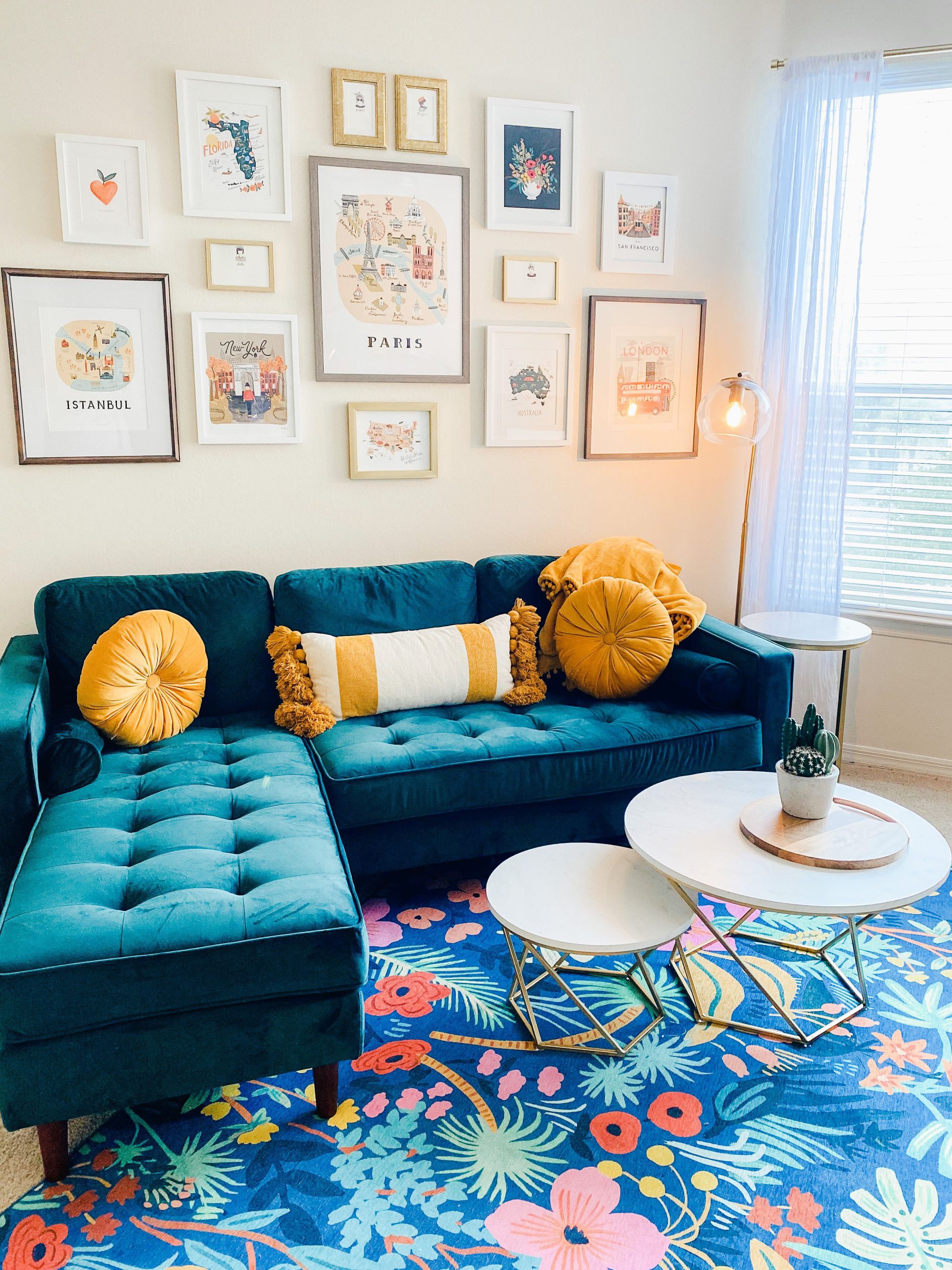 Green Blue Couch with An Eccentric Rug