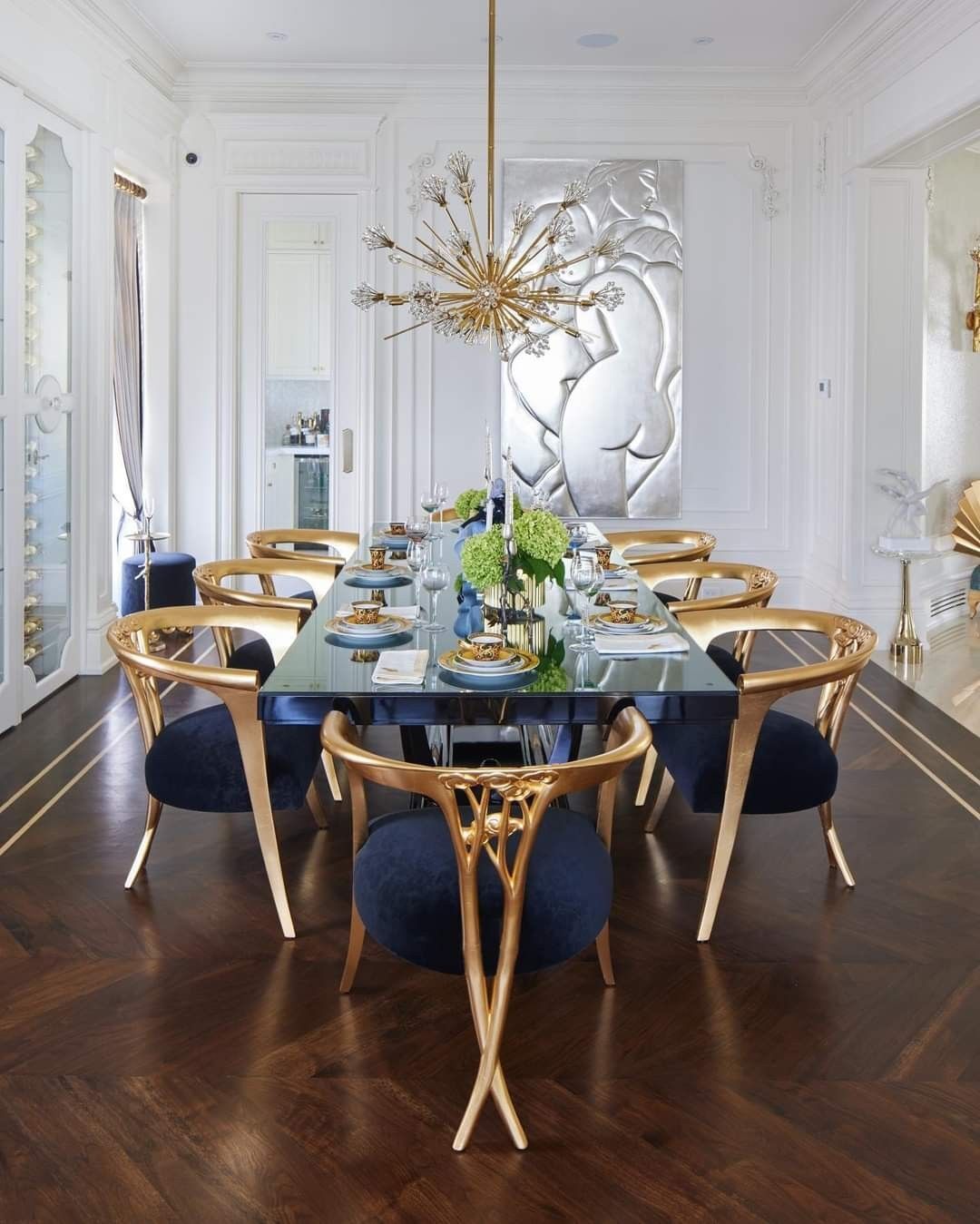 An Elegant Dining Room with Navy Chairs