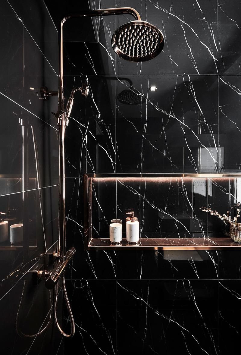 Combining Black Marble and Golden Accents